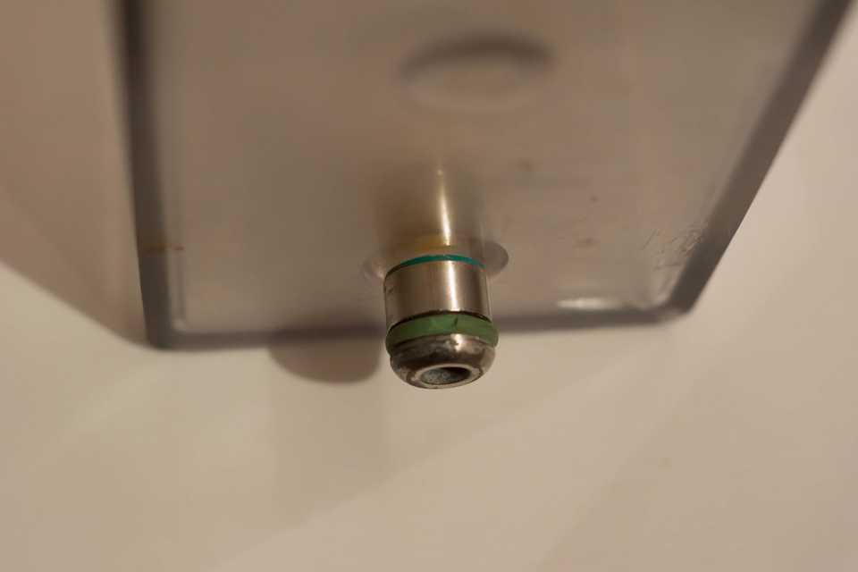 The torn reservoir gasket.